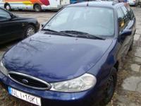 sprzedam Ford Mondeo Kombi 1,8 Diesel, Stan techniczny bardzo dobry, przegląd i OC ważne do 11.2013 R, Samochód zadbany, w pełni sprawny, zarejestrowany, bezwypadkowy!!Wbudowane oryginalne radio.Welurowa tapicerka. Małe wgniecenie widoczne na zdjęciach -