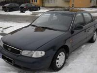 Sprzedam KIA CLARUS 1.8 BENZYNA + GAZ w bd.stanie.Auto posiada el.szyby,wspomaganie,centralny zamek,2x AIR BAG,Autoalarm,imobilaizer.Jeżeli chodzi o blacharkę zero korozji,środek auta zadbany wszystko działa,silnik to najmocniejsza cecha tego auta