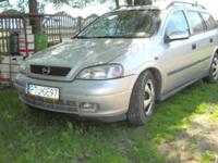 sprzedam opla astre II z 1998r 2.0dtl. Auto w ciaglej eksploatacji wazne oplaty, wyposazenie to 4x poduszuszki powietrzne, funkcyjna kierownica, wspoma, ABS, el.szyby, el.lusterka+podgrzewane, hak, regulowana kierownica, klimatyzacja, c.zamek+pilot, itp.