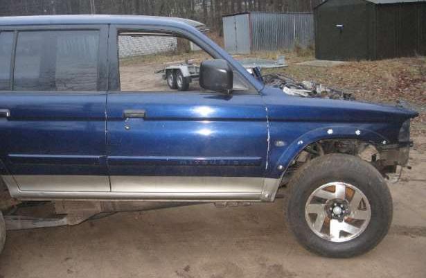Mitsubishi Pajero Sport części karoserii napędy koła amory