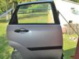 Drzwi Ford Focus 1,6 16V 1999r srebrny metalik