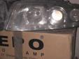 LAMPA LEWA Reflektor LEWY Audi A4 2004 r.