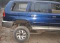 Mitsubishi Pajero Sport części karoserii napędy koła amory