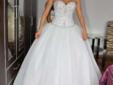 Piękna suknia ślubna z kolekcji Demetrios Lisa Ferrera plus dodatki