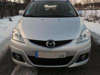 MAZDA 5 2.0CD 2008ROK PO LIFCIE !!
-
-7 OSOBOWY
-KLIMA TRONIK
-TEMPOMAT
-4 X EL.SZYBY
-EL/LUSTERKA
-EL.ŚWIATŁA
-4 X PODŁOKIETNIK
-HALOGENY
-OSZCZĘDNY 5L/100km
-AIRBAGI
-ALUFELGI 16"
-RM CD STEROWANY W KIEROWNICY
-ROLETA
-TEL 882 935 261 LUB ZAMIANA,