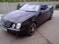 MERCEDES CLK 200 KOMPRESOR CABRIOLET ELEGANCE (163km) + LPG, rok pr. 2001 - MODEL PO LIFTINGU, przebieg 165000 km,automatyczna skrzynia biegów, klimatyzacja, nawigacja GPS, aluminowe felgi 18", czarny metalik, czarna skóra, elektryczne szyby, elektryczne