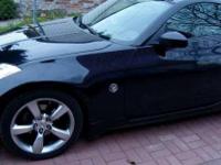 Sprzedam Nissan 350Z ,3.5i V6 ,rok prod.2004,kolor czarny,skrzynia manualna 6 biegowa,62tys.km przebiegu.W wyposażeniu ABS,wspomaganie kierownicy z regulacją wysokości,4xAirBag,klimatyzacja,czarna skórzana tapicerka,fotele elektrycznie regulowane i