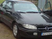 Opel Omega B 2,5 sedan limuzyna,cen. zamek, alufelgi, 2 poduszki, CT, klimatyzacja, el.szyby, el.lusterka podgrzewane, komp. pokladowy, autom. roleta na tylna szybe, komp. opon zimowych, radioCD. Niestety oplaty sie skonczyly z koncem roku.