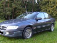 Sprzedam samochód Opel Omega B Benzyna+LPG wbity w dowód. Posiada immobilazer, wspomaganie kierownicy, 2 poduszki powietrzne, elektryczne lusterka, centralny zamek z domykaniem szyb oraz hak. Ogólnie w stanie dobrym, zadbana. Na dokładniejsze pytania co