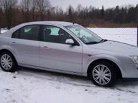 Ford Mondeo rocznik 2001, 115km, w kolorze srebrnym, rok w kraju, Klimatronik, elektryczne szyby. Po wymianie nowych klocków hamulcowych. Samochód posiada komplet kół zimowych i letnich na alufelgach. Samochód bardzo wygodny, ładnie prezentujący się,