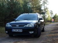 Pilnie sprzedam Forda Mondeo kombi,115 KM, kolor czarny metalik,2005r. bezwypadkowy, garażowany.Samochód godny polecenia,serwisowany (kpl.dokumentów ,dwa oryginalne kluczyki,karta z kodami do radia),elektrycznie podgrzewane szyby (przedni,tylna)