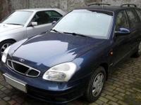 Daewoo Nubira II 2,0 benzyna (133kM) kombi. Bogata wersja wyposażenia CDX. Między innymi ABS, klimatyzacja, 4 szyby elektryczne, elektryczne i podgrzewane lusterka, centralny zamek, halogeny, etc... Samochód kupiony w salonie Daewoo w Koszalinie 30